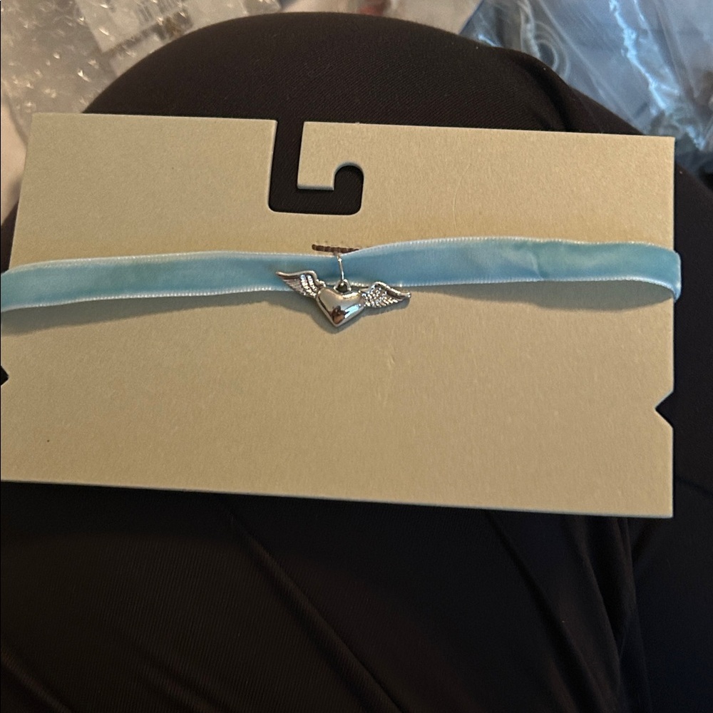 NWT Silver Heart Charm Blue Ribbon necklace